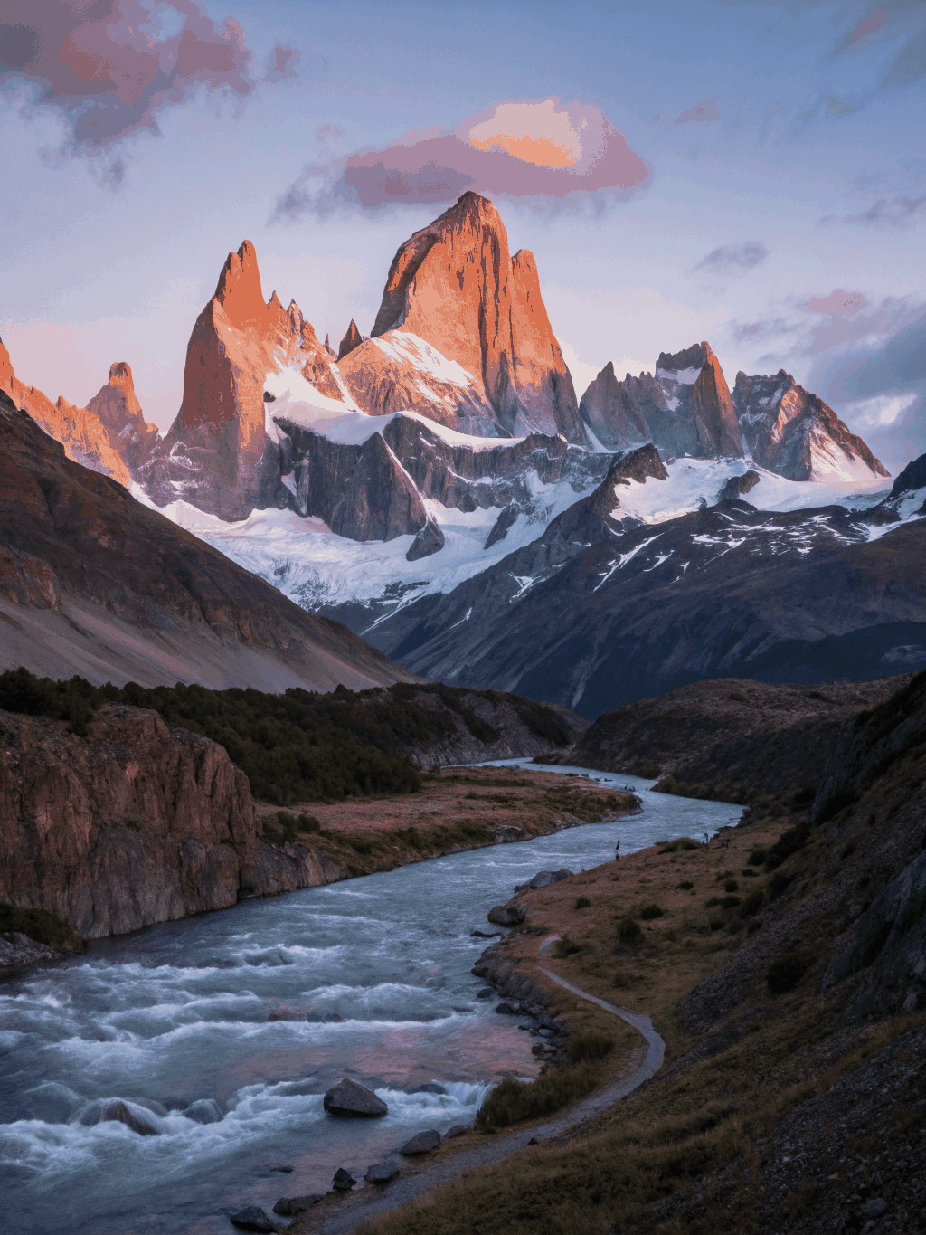 Mount Fitz Roy granite spires catching alpine dawn alpenglow