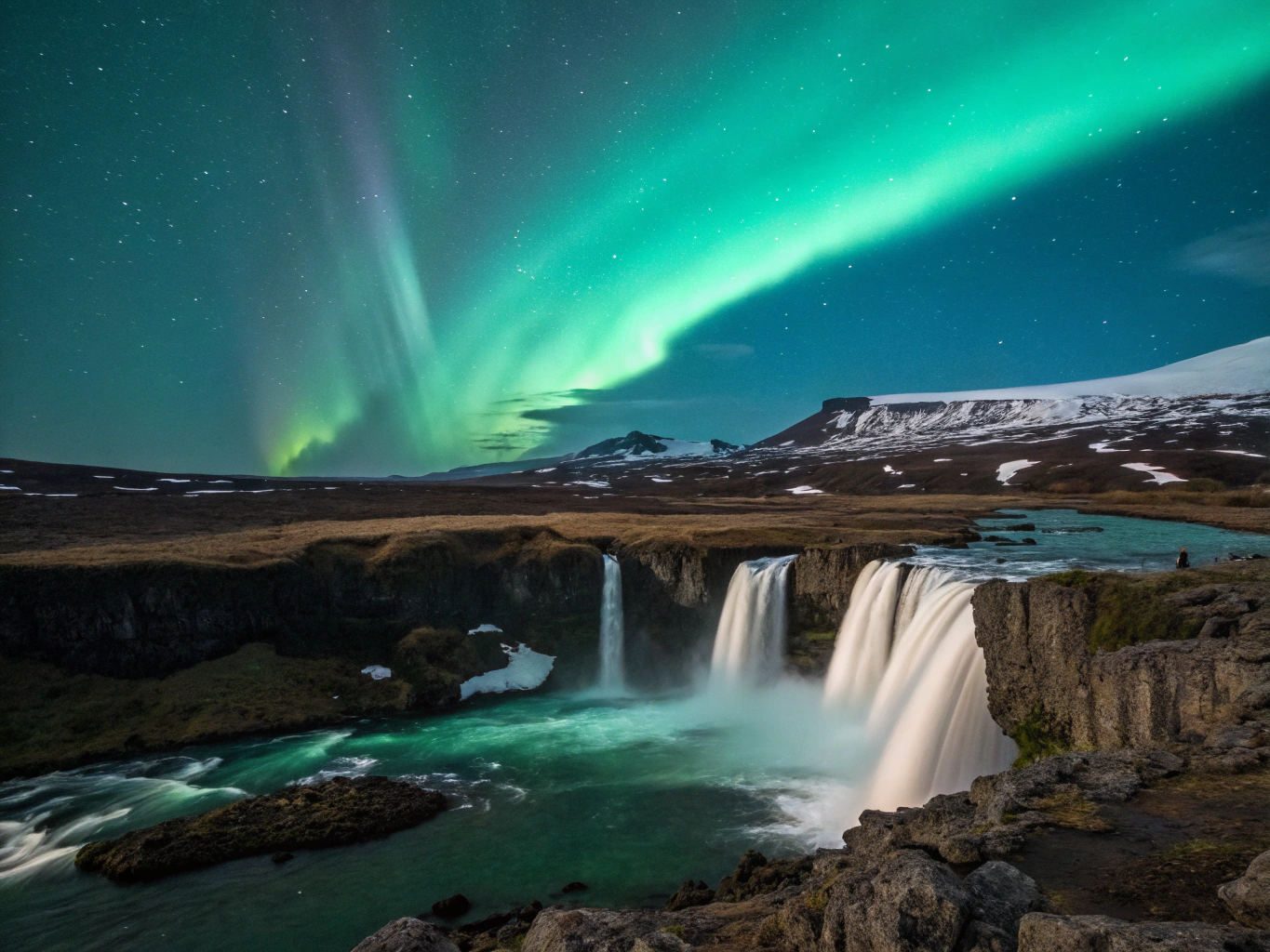 Volcanic basalt formations under dancing green aurora lights